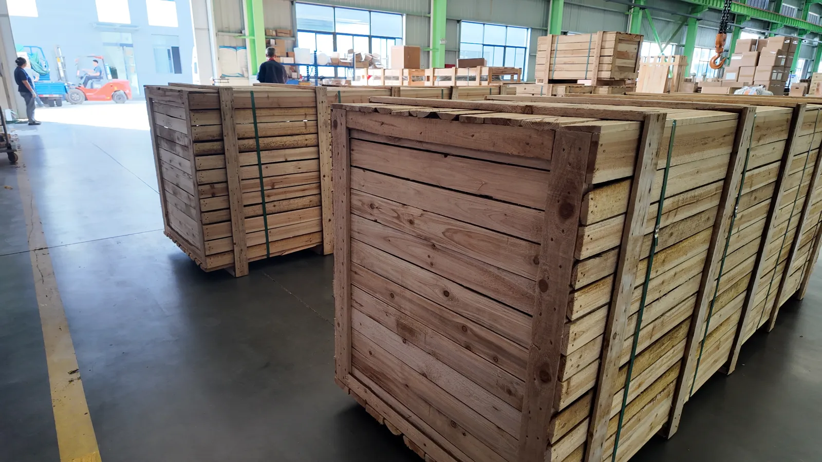 Timber-framed wooden crates with packing straps in the Changyu workshop.