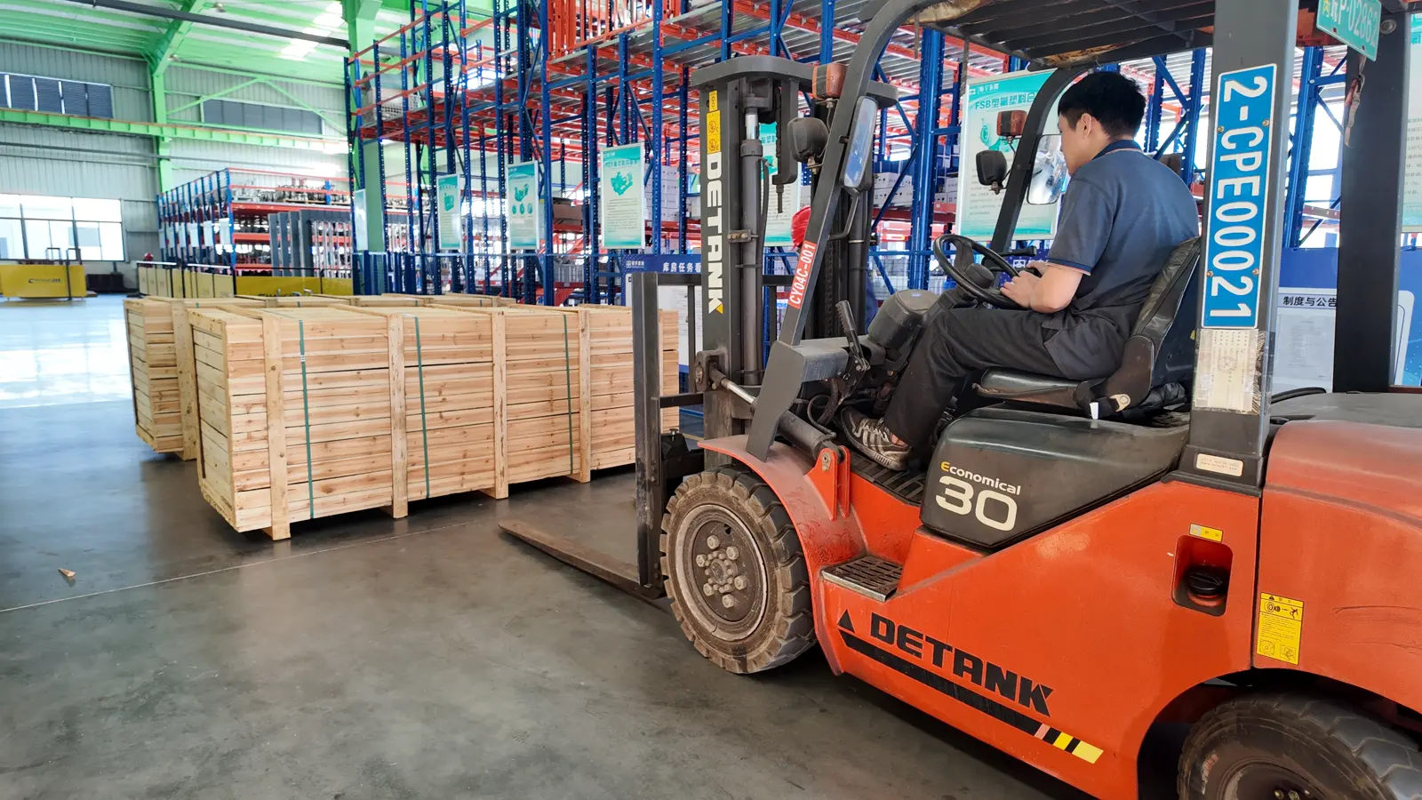 A forklift beside wooden crates during handling in the Changyu factory.